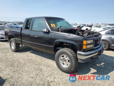Czwarte zdjęcie samochodu z boku: 1998 GMC SIERRA K1500 VIN:1GTEK19R8WR500984 - miniatura