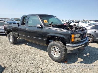 Czwarte zdjęcie samochodu z boku: 1998 GMC SIERRA K1500 VIN:1GTEK19R8WR500984 - miniatura