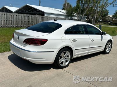 Czwarte zdjęcie samochodu z boku: 2013 VOLKSWAGEN CC SPORT VIN:WVWBN7AN7DE511176 - miniatura