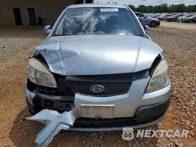Piąte zdjęcie samochodu w środku: 2009 KIA RIO BASE VIN:KNADE223996441851 - miniatura