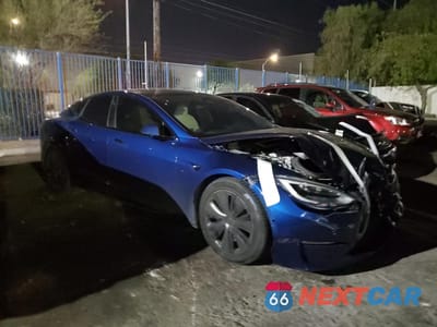 Czwarte zdjęcie samochodu z boku: 2021 TESLA MODEL S VIN:5YJSA1E52MF453771 - miniatura