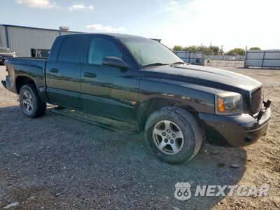 Czwarte zdjęcie samochodu z boku: 2007 DODGE DAKOTA QUAD SLT VIN:1D7HE48N97S166520 - miniatura