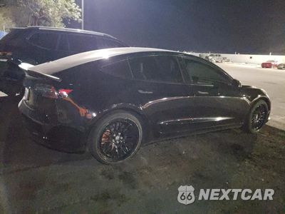 Trzecie zdjęcie samochodu z tyłu: 2019 TESLA MODEL 3 VIN:5YJ3E1EB5KF391567 - miniatura