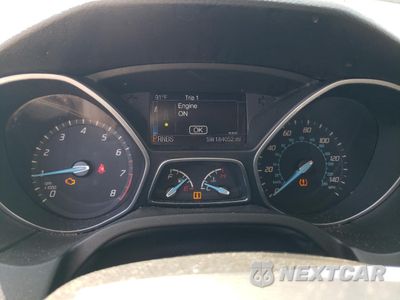 Zdjęcie 9 z 12 samochodu: 2014 FORD FOCUS TITANIUM VIN:1FADP3N23EL207535 - miniatura