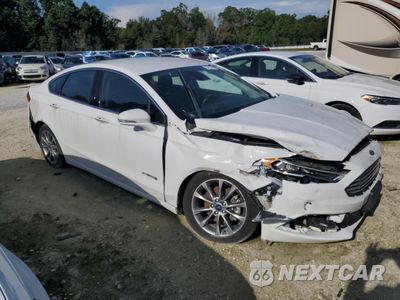 Czwarte zdjęcie samochodu z boku: 2017 FORD FUSION SE HYBRID VIN:3FA6P0LU3HR409650 - miniatura
