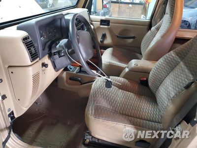 Zdjęcie 7 z 14 samochodu: 1999 JEEP WRANGLER / TJ SPORT VIN:1J4FY19S1XP492501 - miniatura