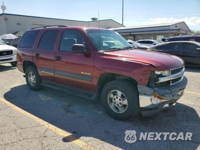 Czwarte zdjęcie samochodu z boku: 2003 CHEVROLET TAHOE C1500 VIN:1GNEC13Z73J127234 - miniatura