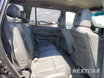Zdjęcie 11 z 13 samochodu: 2004 HONDA PILOT VIN:2HKYF18574H530605 - miniatura