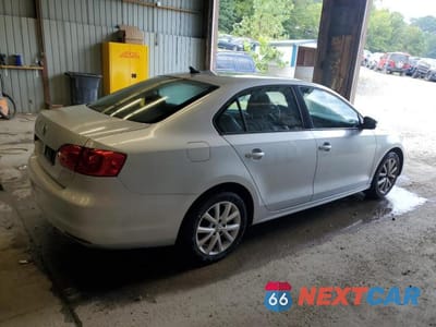 Trzecie zdjęcie samochodu z tyłu: 2012 VOLKSWAGEN JETTA SE VIN:3VWBP7AJXCM341067 - miniatura