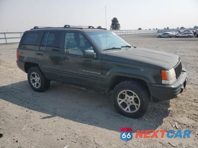 Czwarte zdjęcie samochodu z boku: 1996 JEEP GRAND CHEROKEE LIMITED VIN:1J4GZ78Y4TC235781 - miniatura