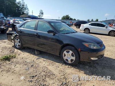 Czwarte zdjęcie samochodu z boku: 2002 TOYOTA CAMRY LE VIN:4T1BE32K62U002580 - miniatura