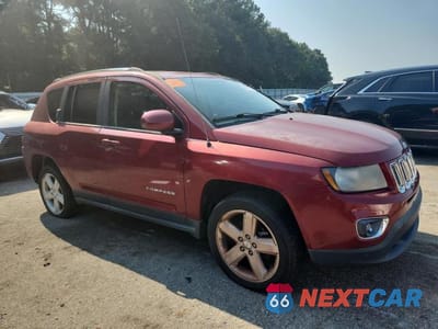 Czwarte zdjęcie samochodu z boku: 2014 JEEP COMPASS LATITUDE VIN:1C4NJCEA0ED680455 - miniatura