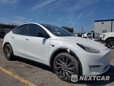 Czwarte zdjęcie samochodu z boku: 2023 TESLA MODEL Y VIN:7SAYGDEF8PF870516 - miniatura
