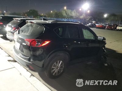 Trzecie zdjęcie samochodu z tyłu: 2016 MAZDA CX-5 TOURING VIN:JM3KE2CY9G0786681 - miniatura