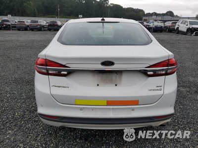 Zdjęcie 6 z 12 samochodu: 2018 FORD FUSION SE HYBRID VIN:3FA6P0LU3JR129944 - miniatura