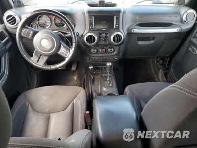 Zdjęcie 8 z 12 samochodu: 2014 JEEP WRANGLER UNLIMITED SAHARA VIN:1C4HJWEG4EL272890 - miniatura