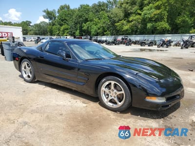 Czwarte zdjęcie samochodu z boku: 2004 CHEVROLET CORVETTE VIN:1G1YY22G745122275 - miniatura
