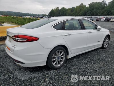 Trzecie zdjęcie samochodu z tyłu: 2017 FORD FUSION SE HYBRID VIN:3FA6P0LU4HR410032 - miniatura