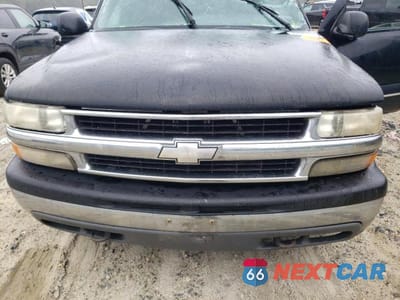 Zdjęcie 12 z 13 samochodu: 2001 CHEVROLET TAHOE K1500 VIN:1GNEK13T41J106837 - miniatura