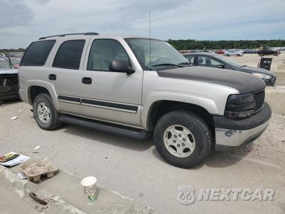 Czwarte zdjęcie samochodu z boku: 2004 CHEVROLET TAHOE C1500 VIN:1GNEC13V54R322166 - miniatura
