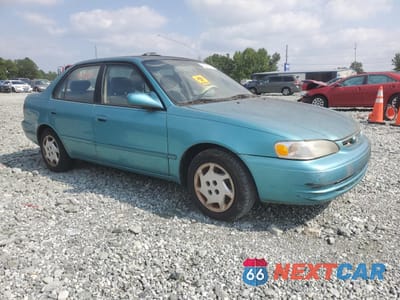 Czwarte zdjęcie samochodu z boku: 1999 TOYOTA COROLLA VE VIN:1NXBR12E7XZ186275 - miniatura