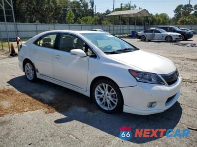 Czwarte zdjęcie samochodu z boku: 2010 LEXUS HS 250H VIN:JTHBB1BAXA2001997 - miniatura