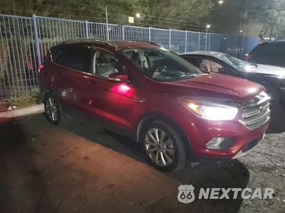 Czwarte zdjęcie samochodu z boku: 2018 FORD ESCAPE TITANIUM VIN:1FMCU9J98JUA21719 - miniatura