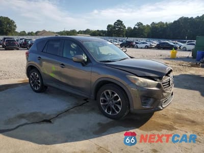 Czwarte zdjęcie samochodu z boku: 2016 MAZDA CX-5 GT VIN:JM3KE4DY6G0805889 - miniatura