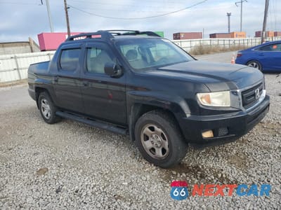 Czwarte zdjęcie samochodu z boku: 2011 HONDA RIDGELINE RT VIN:5FPYK1F22BB009547 - miniatura