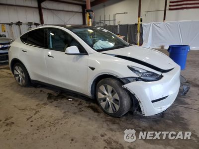 Czwarte zdjęcie samochodu z boku: 2023 TESLA MODEL Y VIN:7SAYGDEE0PA103666 - miniatura