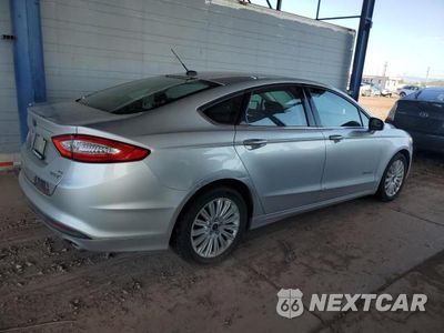 Trzecie zdjęcie samochodu z tyłu: 2014 FORD FUSION SE HYBRID VIN:3FA6P0LU6ER317489 - miniatura
