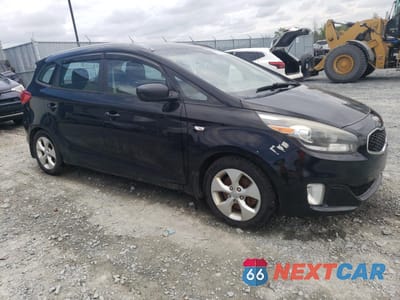 Czwarte zdjęcie samochodu z boku: 2014 KIA RONDO VIN:KNAHT8A3XE7052975 - miniatura