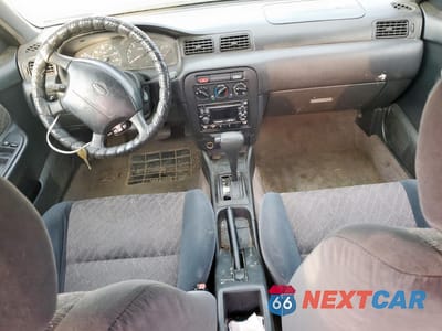 Zdjęcie 8 z 12 samochodu: 1999 NISSAN SENTRA BASE VIN:1N4AB41D4XC717507 - miniatura