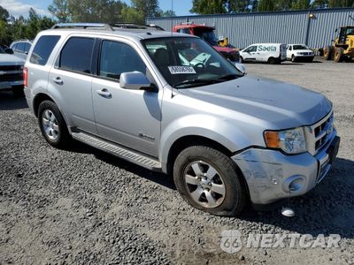 Czwarte zdjęcie samochodu z boku: 2010 FORD ESCAPE HYBRID VIN:1FMCU4K30AKC15394 - miniatura