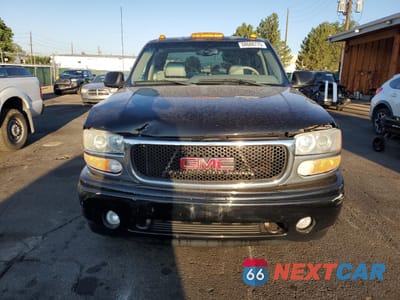 Piąte zdjęcie samochodu w środku: 2002 GMC SIERRA K1500 DENALI VIN:2GTFK69U921389080 - miniatura