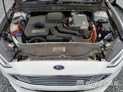 Zdjęcie 11 z 12 samochodu: 2018 FORD FUSION SE HYBRID VIN:3FA6P0LU4JR171796 - miniatura