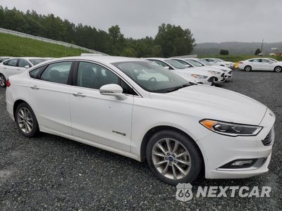 Czwarte zdjęcie samochodu z boku: 2017 FORD FUSION SE HYBRID VIN:3FA6P0LU3HR359591 - miniatura