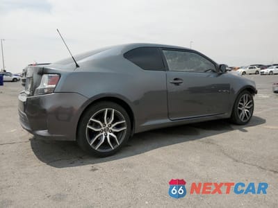 Trzecie zdjęcie samochodu z tyłu: 2014 TOYOTA SCION TC VIN:JTKJF5C79E3083855 - miniatura