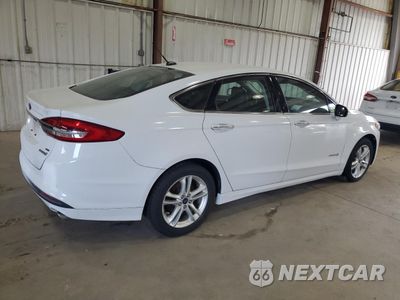 Trzecie zdjęcie samochodu z tyłu: 2018 FORD FUSION SE HYBRID VIN:3FA6P0LU5JR287007 - miniatura