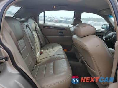 Zdjęcie 10 z 15 samochodu: 2000 LINCOLN TOWN CAR EXECUTIVE VIN:1LNHM81W0YY784410 - miniatura