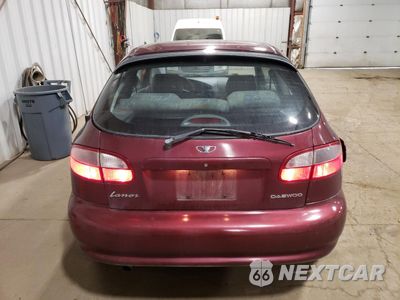 Zdjęcie 6 z 13 samochodu: 1999 DAEWOO LANOS SE VIN:KLATB2261XB326948 - miniatura