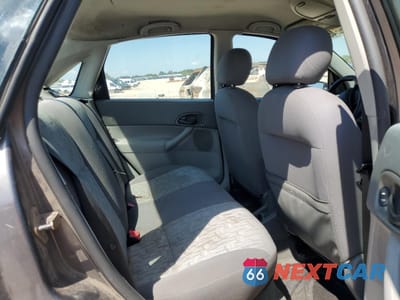 Zdjęcie 10 z 14 samochodu: 2005 FORD FOCUS ZX4 VIN:1FAFP34N35W112850 - miniatura