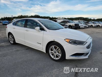 Czwarte zdjęcie samochodu z boku: 2018 FORD FUSION SE HYBRID VIN:3FA6P0LU4JR278749 - miniatura