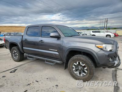 Czwarte zdjęcie samochodu z boku: 2017 TOYOTA TACOMA DOUBLE CAB VIN:3TMCZ5AN6HM079189 - miniatura