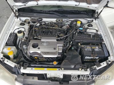 Zdjęcie 11 z 13 samochodu: 2001 NISSAN MAXIMA GXE VIN:JN1CA31A71T306585 - miniatura