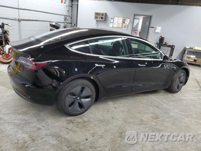 Trzecie zdjęcie samochodu z tyłu: 2018 TESLA MODEL 3 VIN:5YJ3E1EB5JF144239 - miniatura