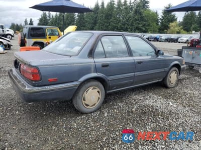 Trzecie zdjęcie samochodu z tyłu: 1992 TOYOTA COROLLA DLX VIN:JT2AE94A0N0300070 - miniatura