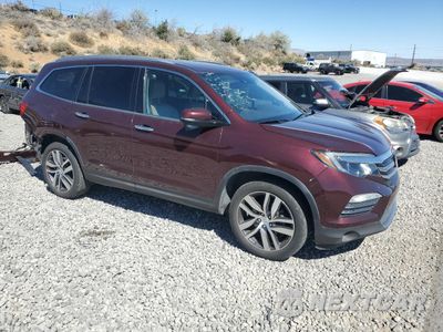 Czwarte zdjęcie samochodu z boku: 2017 HONDA PILOT TOURING VIN:5FNYF6H97HB009136 - miniatura