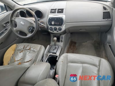Zdjęcie 8 z 12 samochodu: 2003 NISSAN ALTIMA BASE VIN:1N4AL11D63C242836 - miniatura
