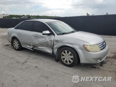 Czwarte zdjęcie samochodu z boku: 2009 FORD TAURUS SE VIN:1FAHP23W89G119743 - miniatura